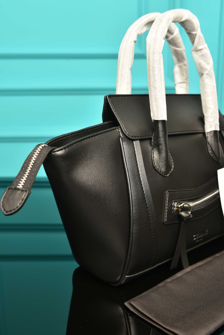 '-Small New Luggage in Supple