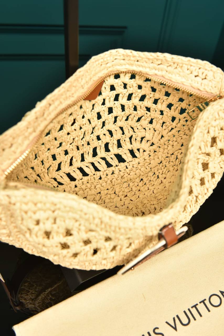 '-Icare in Raffia