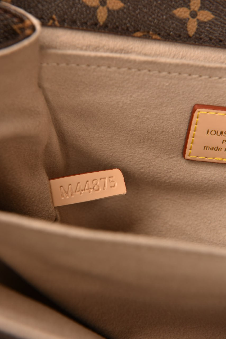'- Metis Pochette
