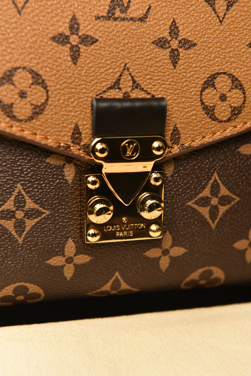 '- Metis Pochette