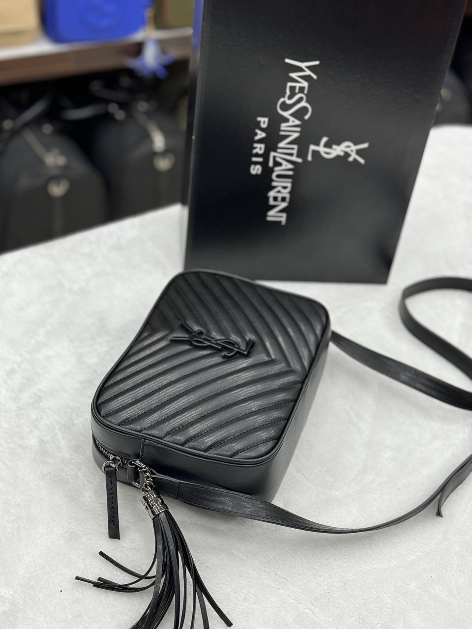 '-  Lou Camera Bag