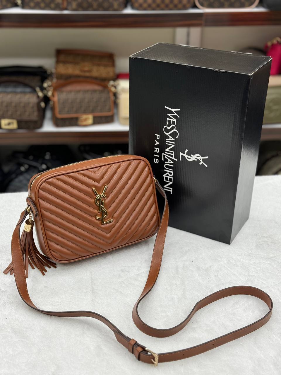 '-  Lou Camera Bag