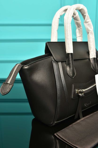 '-Small New Luggage in Supple