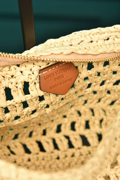 '-Icare in Raffia