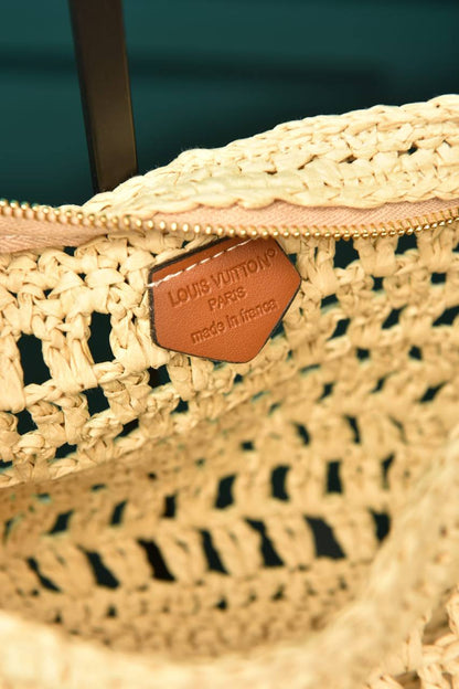'-Icare in Raffia