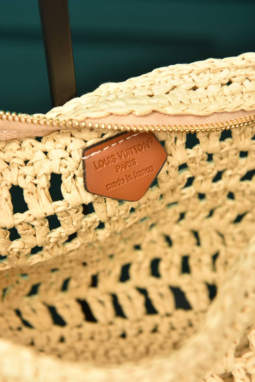 '-Icare in Raffia