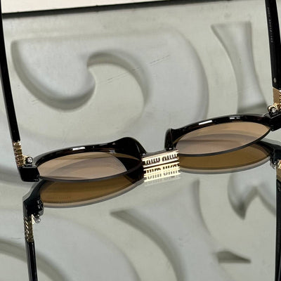 M - Sunglasses